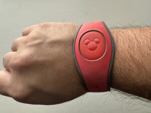 Red Magicband on Christopher's hand